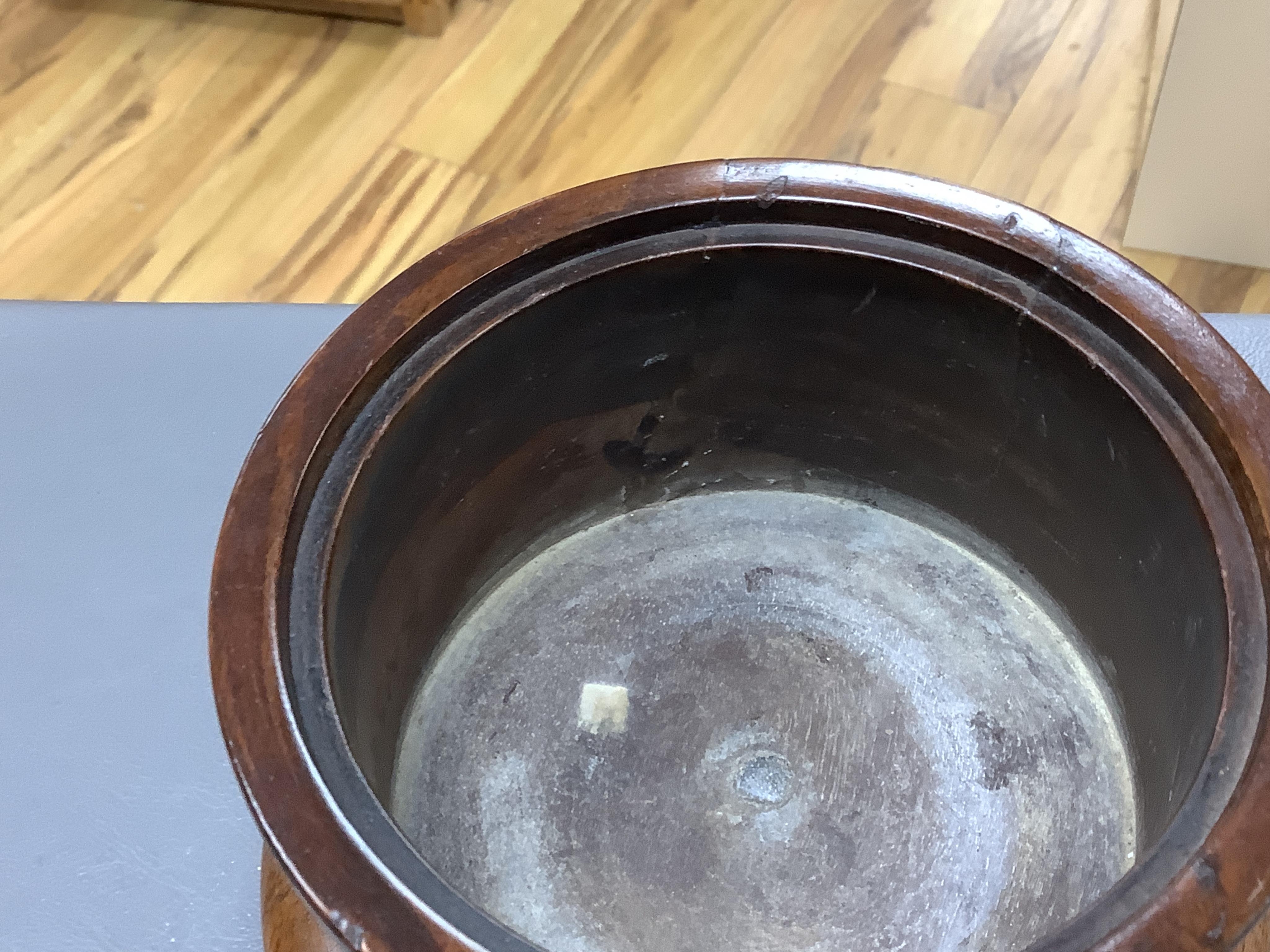 An 18th/19th century lignum vitae wassail bowl and a circular mahogany tobacco box, largest 18cm high